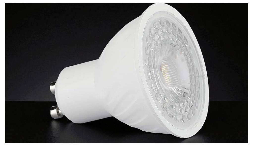 Ampoule projecteur LED blanche avec deux broches métalliques, présentée sur un fond sombre