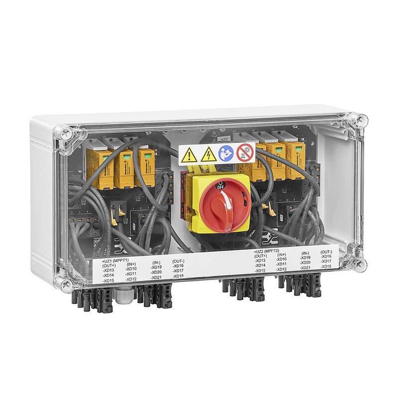 Boîtier de commande électrique transparent avec modules orange, câblage et un grand interrupteur rotatif rouge/jaune de déconnexion étiqueté arrêt/marche.