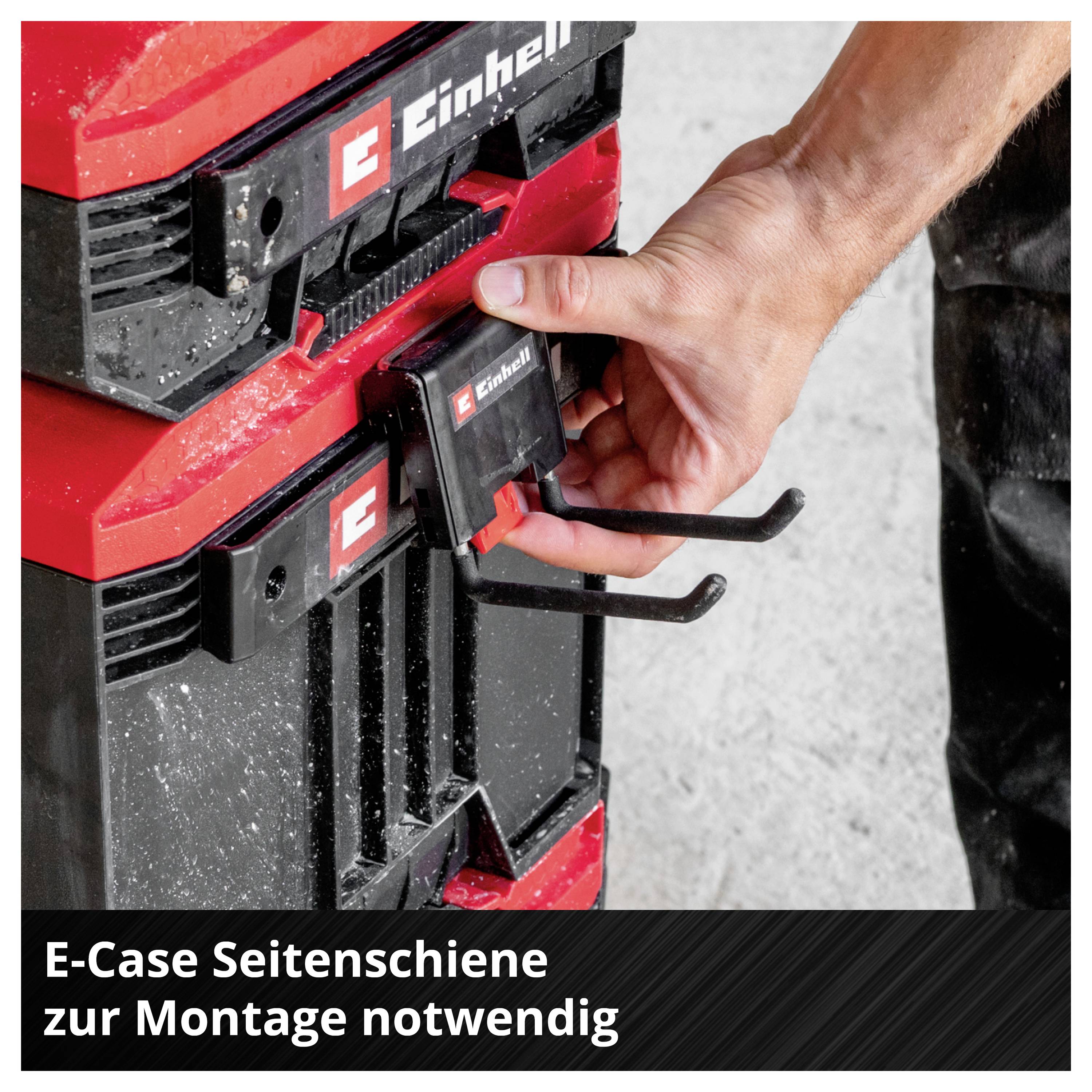 Main fixe une pièce Einhell à un appareil rouge ; texte : « Rail latéral E-Case nécessaire pour le montage ».