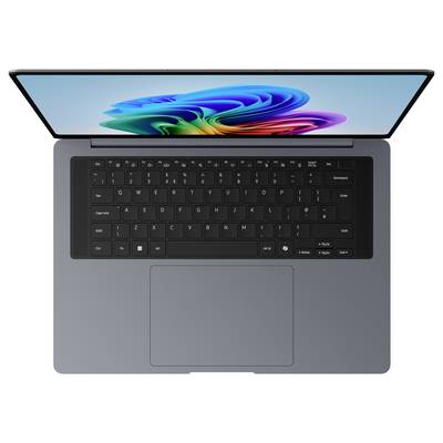 Vue de dessus d'un ordinateur portable gris avec un fond d'écran abstrait coloré sur l'écran et un grand pavé tactile centré.