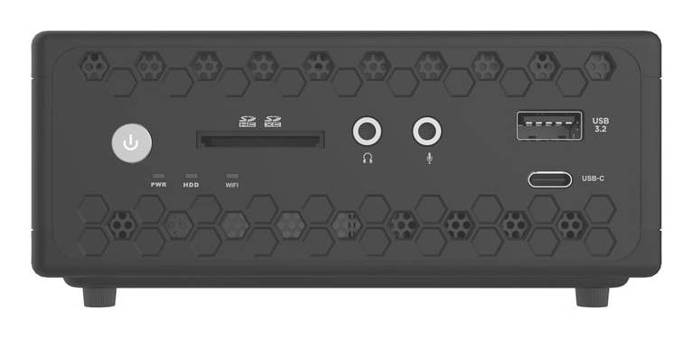 Vue de face d'un panneau avant de boîtier informatique noir avec bouton d'alimentation, fente de lecteur de carte, prises casque et microphone, ports USB et motif de ventilation hexagonale.