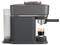 Machine à espresso moderne avec trémie à grains et porte-filtre préparant un seul shot dans une tasse en verre.