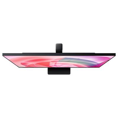 Vue de côté d'un moniteur écran plat avec un affichage abstrait rose, présenté avec un support central.