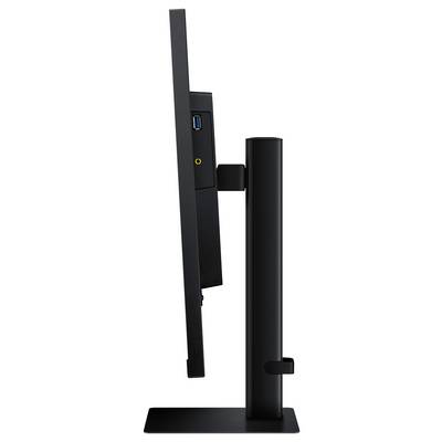 Support de moniteur ajustable noir montré en vue latérale, avec un port USB et une ouverture de passage de câble à l'arrière du socle d'affichage.