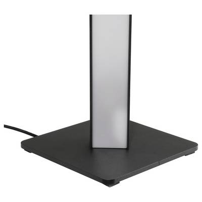 Gros plan d'une base de lampe carrée noire avec une colonne lumineuse verticale argentée visible et un cordon d'alimentation, montré sur un fond blanc.