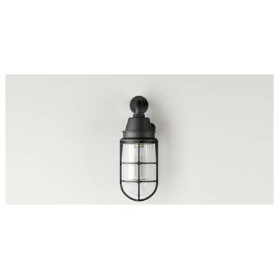 Applique murale de style industriel noir avec un garde-cage transparent, montée sur un mur à texture légère.