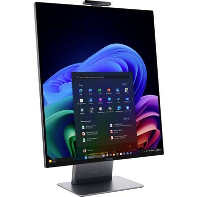 Moniteur de bureau affichant un menu de démarrage Windows 11 sur le fond d'écran bleu-violet par défaut, montrant des icônes d'applications et une barre des tâches à l'écran.