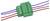 Bloc de jonction électrique vert rejoignant quatre fils de couleur sur chaque côté, utilisé pour connecter ou éplicer les câbles.
