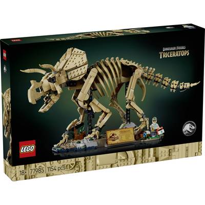 Boîte du set LEGO Dinosaur Fossils Triceratops montrant un modèle de squelette couleur tan avec socle d'exposition pour minifigurine, étiqueté 18+ et 1154 pièces.
