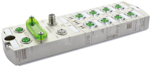 Module d'automatisation industrielle avec de multiples connecteurs circulaires verts et un couvercle translucide, présenté sur un fond blanc.
