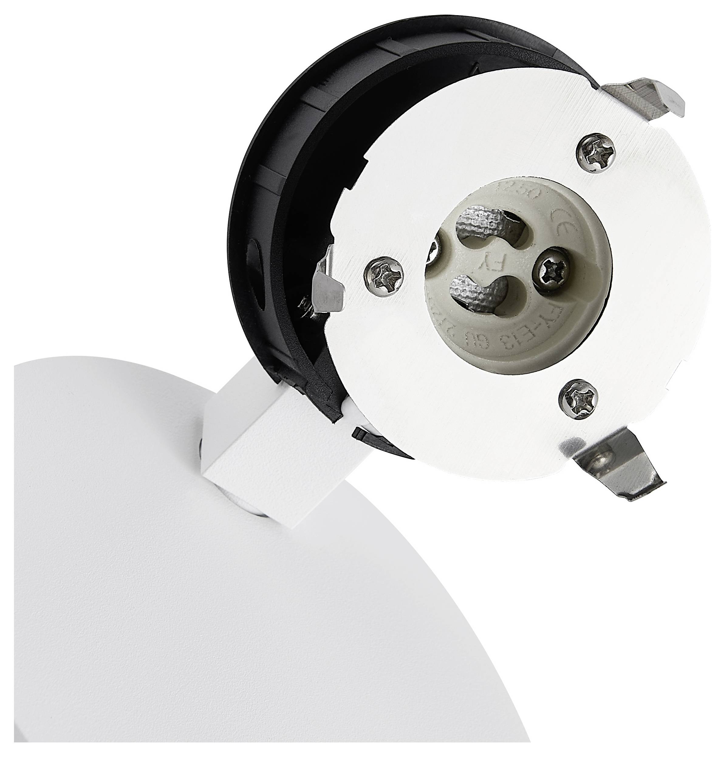Gros plan d'une douille de lumière encastrée avec un boîtier de fixture noir et blanc et des bornes de vis exposées sur un fond blanc.