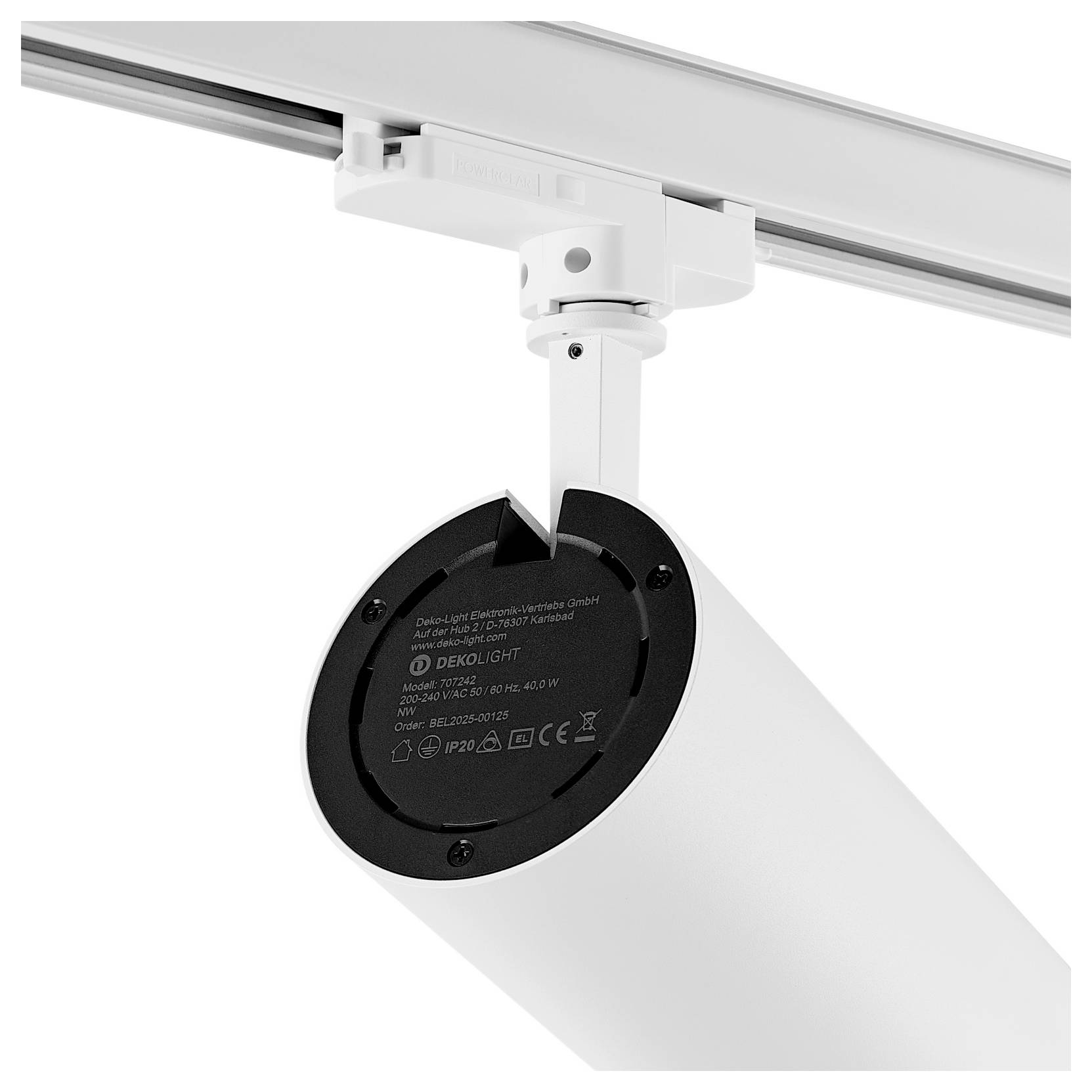 Projecteur cylindrique blanc sur rail, avec support orientable, présenté incliné vers le bas sur un rail de plafond.