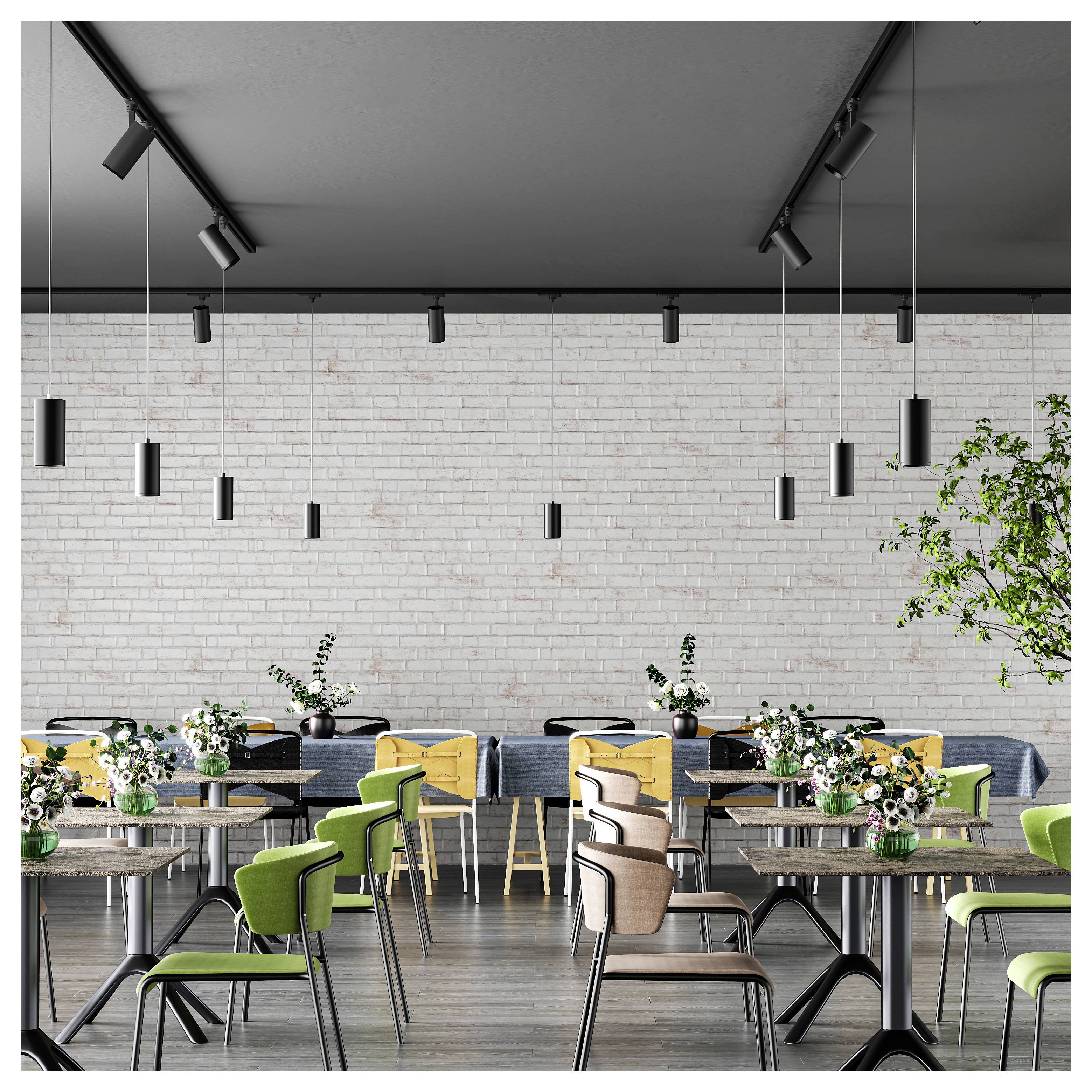 Gros plan d'un luminaire encastré de plafond cylindrique moderne avec un boîtier extérieur blanc et un rebord noir autour d'une lentille en verre texturé.