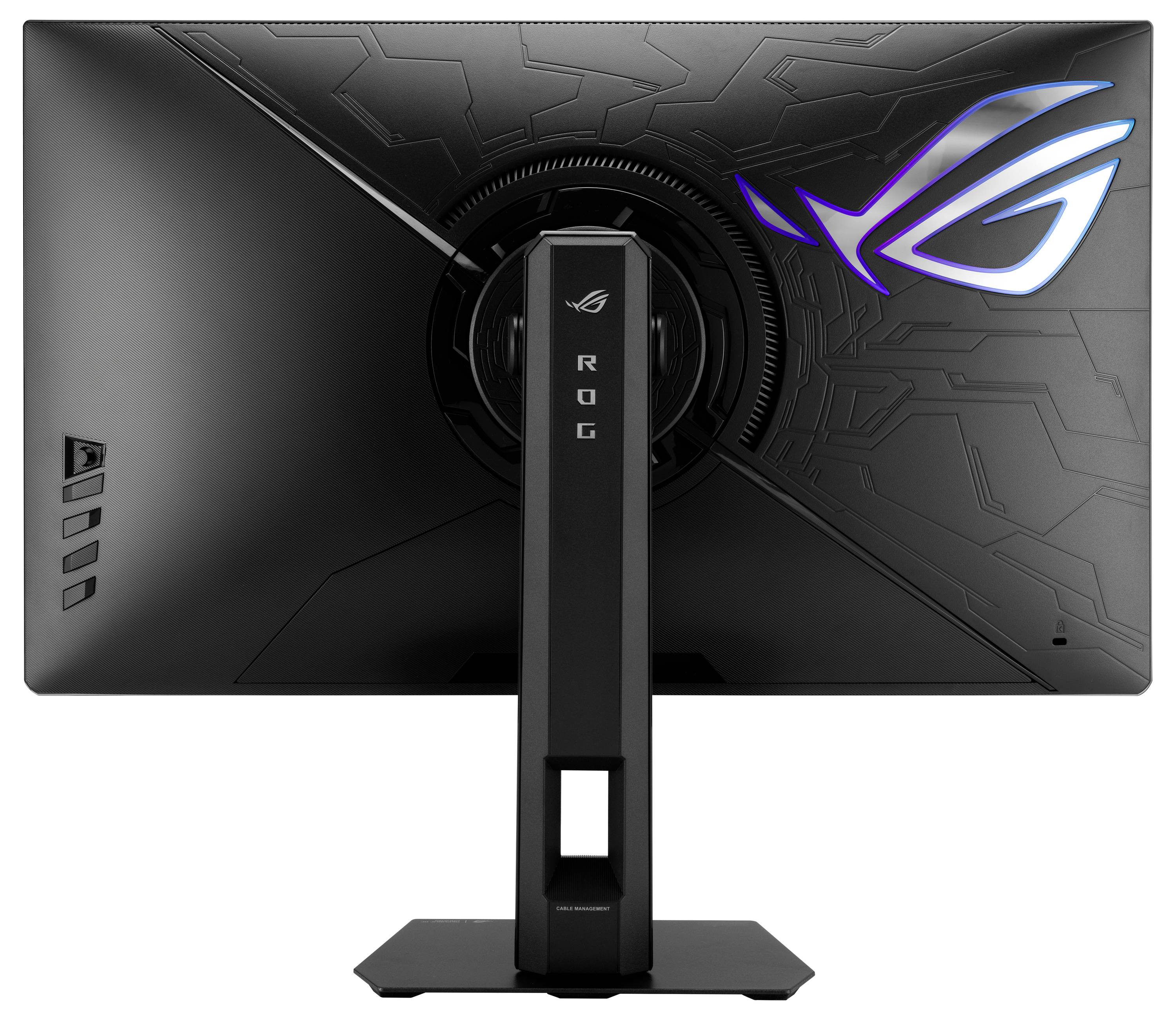 Vue arrière d'un moniteur de jeu ROG noir sur un support, avec logo ROG illuminé et design de panneau texturé angulaire.