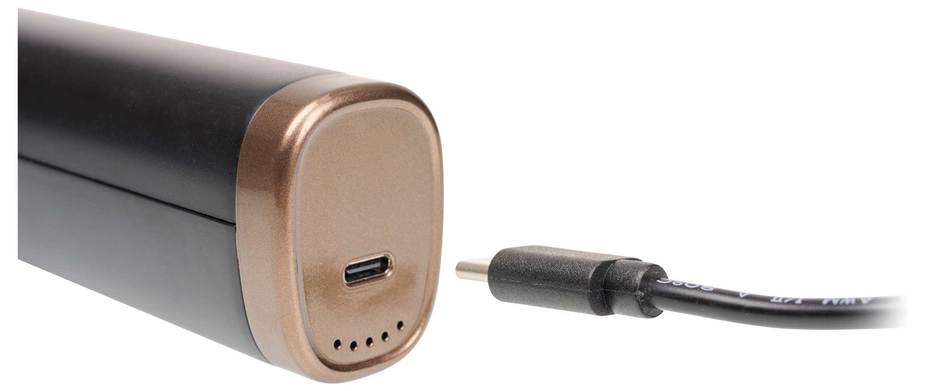 Gros plan d'une batterie externe noire avec un embout de couleur or rose et un port USB-C, avec l'embout d'un câble de recharge positionné à côté.