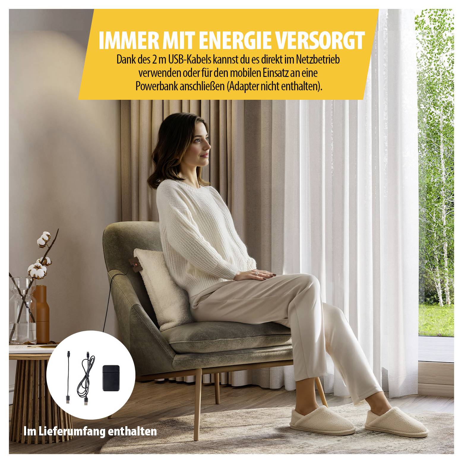 Une femme est assise confortablement sur un fauteuil près de la fenêtre; texte indicatif : « Toujours alimenté en énergie » grâce au câble USB de 2 m pour la connexion de la batterie externe, adaptateur non inclus.