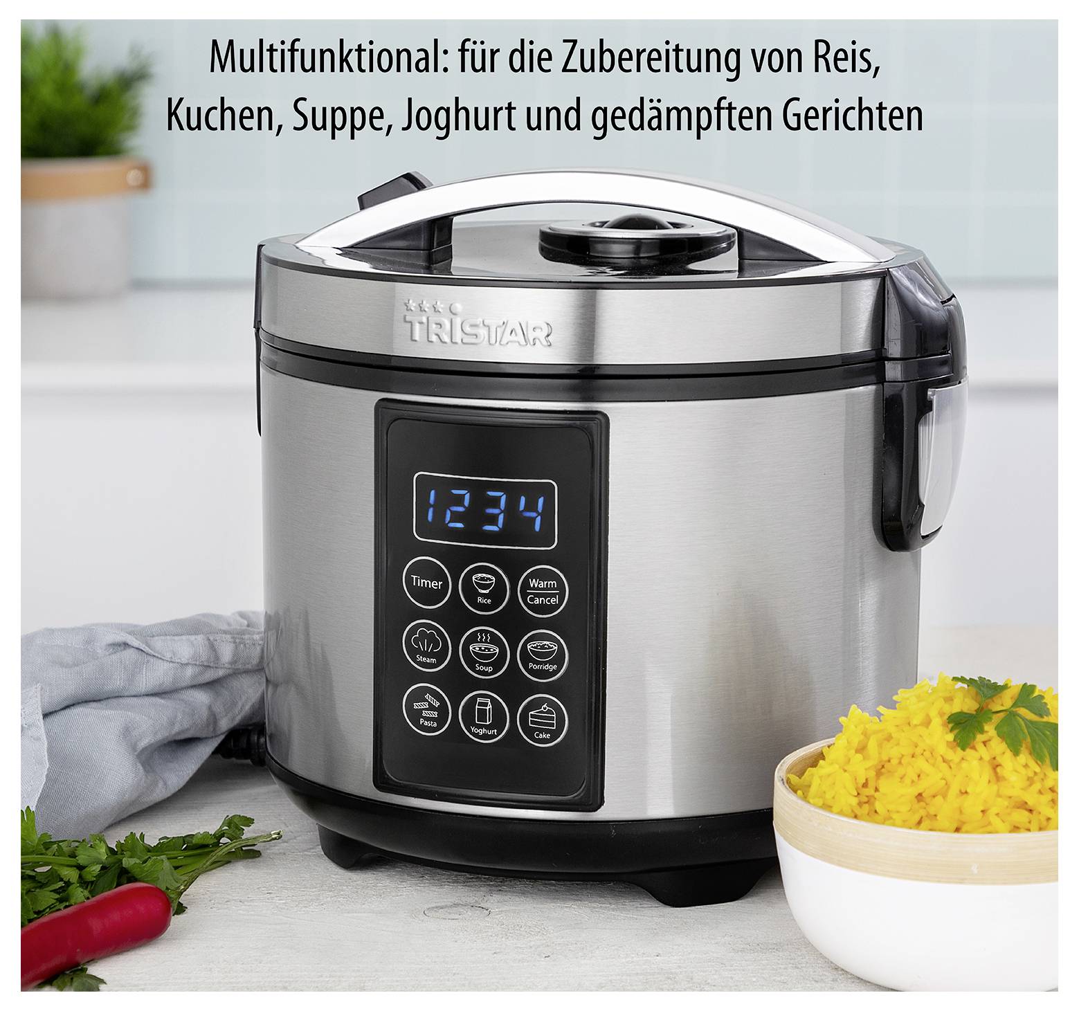 Cuiseur à riz multifonction en acier inoxydable avec commandes numériques, montré avec du riz, des herbes et des légumes ; le texte en allemand indique qu'il cuit le riz, les gâteaux, la soupe, le yaourt et les plats cuits à la vapeur.