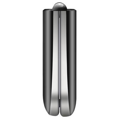 Gros plan d'un objet cylindrique noir avec un capuchon arrondi et une fente verticale argentée, ressemblant à une petite poubelle ou distributeur.