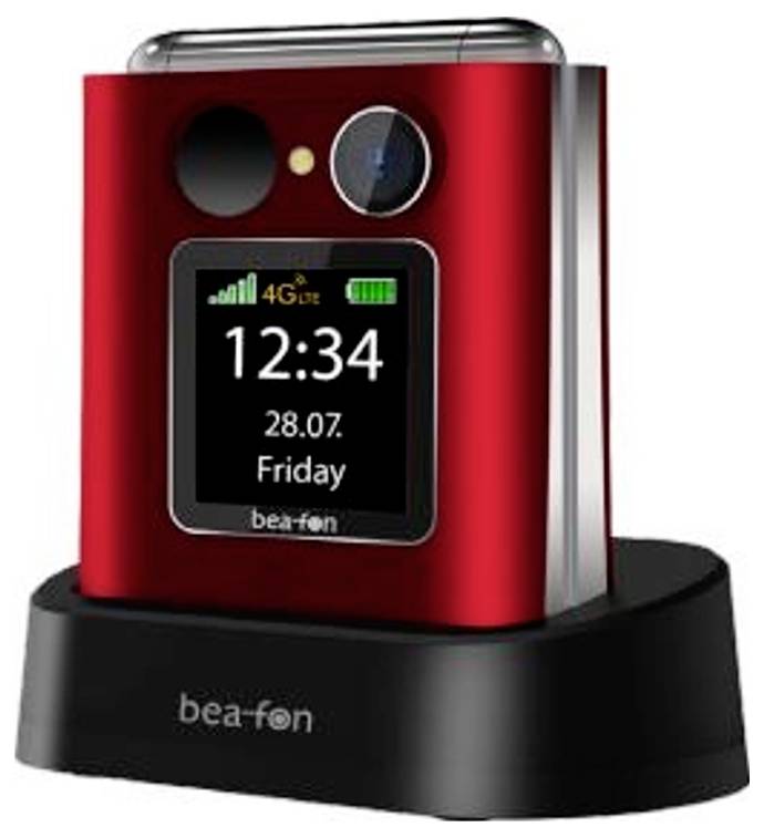 Téléphone mobile Red Bea-fon dans un socle de charge noir, affichant un écran avec 12:34, 28.07., vendredi, et des icônes de signal 4G.