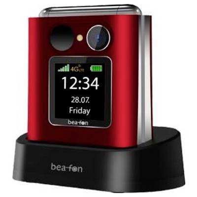 Téléphone mobile Red Bea-fon dans un socle de charge noir, affichant un écran avec 12:34, 28.07., vendredi, et des icônes de signal 4G.