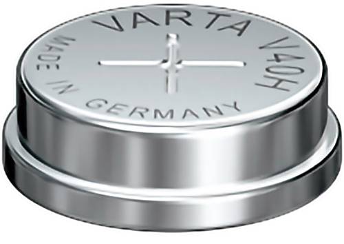 Gros plan d'une pile bouton en argent étiquetée 'VARTA' et 'Made in Germany'.
