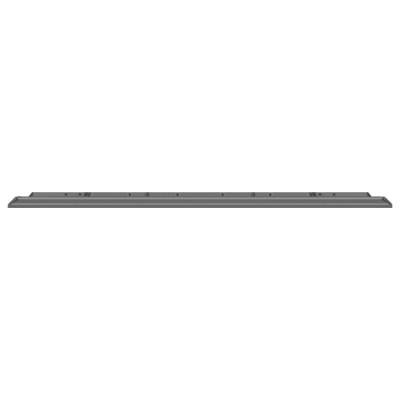 Vue latérale d'un ordinateur portable noir et fin montrant le clavier et le couvercle fermé.