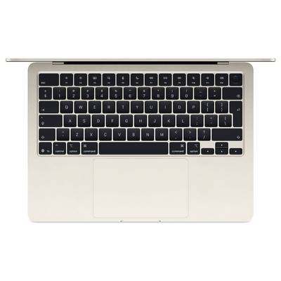 Vue de dessus d'un ordinateur portable argenté avec un clavier noir et un grand pavé tactile.