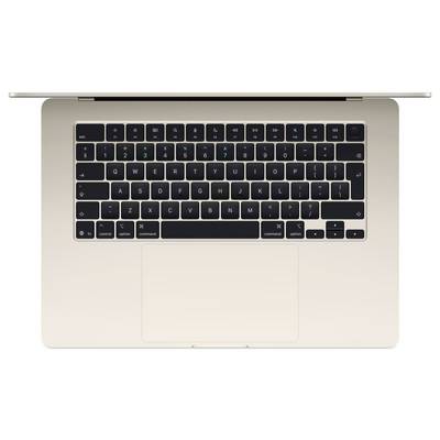 Vue de dessus d'un MacBook ouvert avec un clavier noir et un grand trackpad sur un boîtier clair.