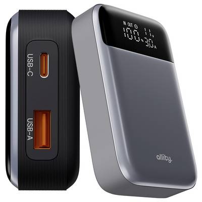 Banque d'alimentation grise et noire avec écran numérique affichant le statut d'entrée/sortie, plus ports USB-C et USB-A sur le côté.