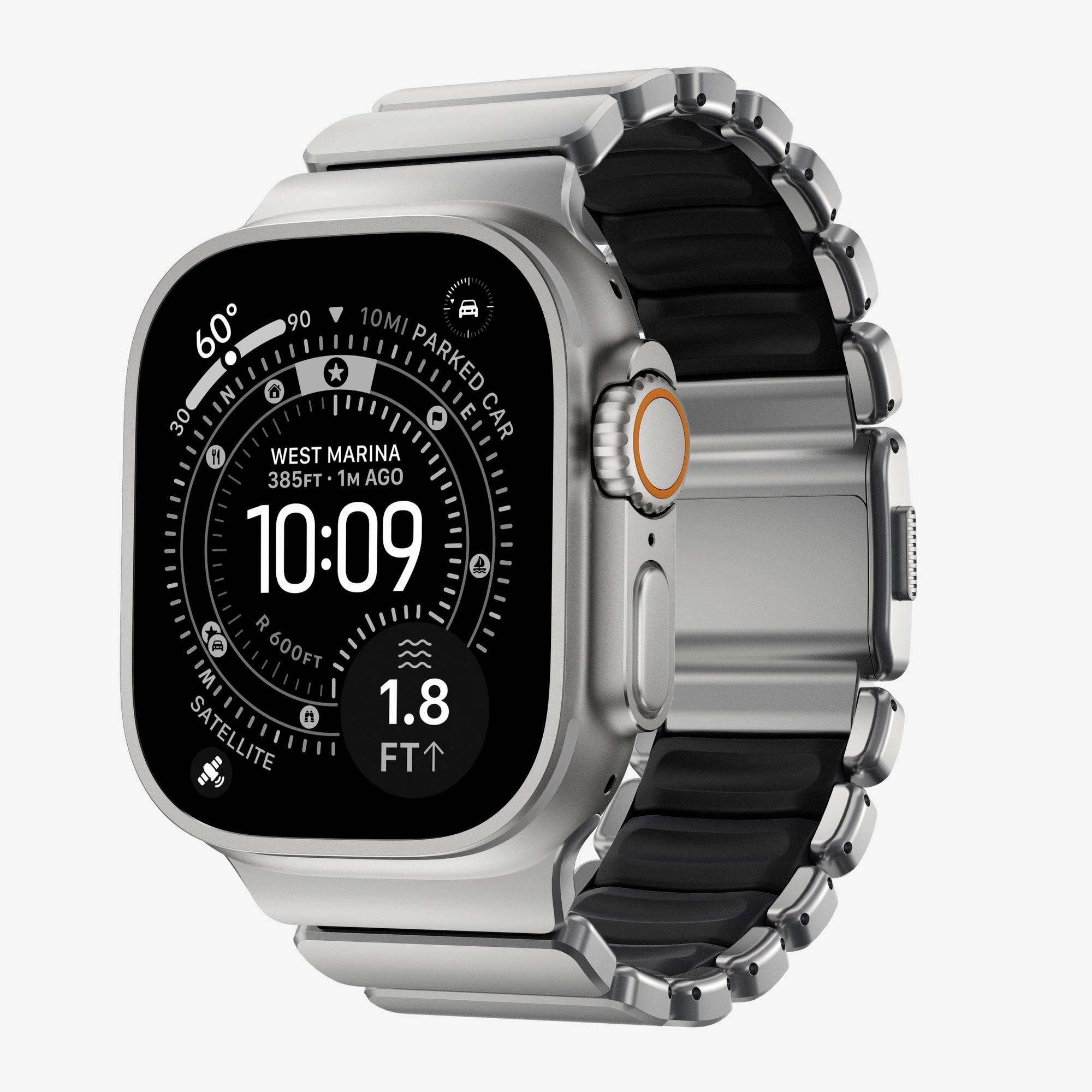 Montre intelligente argentée avec bracelet noir affichant un cadran de montre style boussole, heure 10:09, température 60°, localisation West Marina, et altitude 1,8 ft.