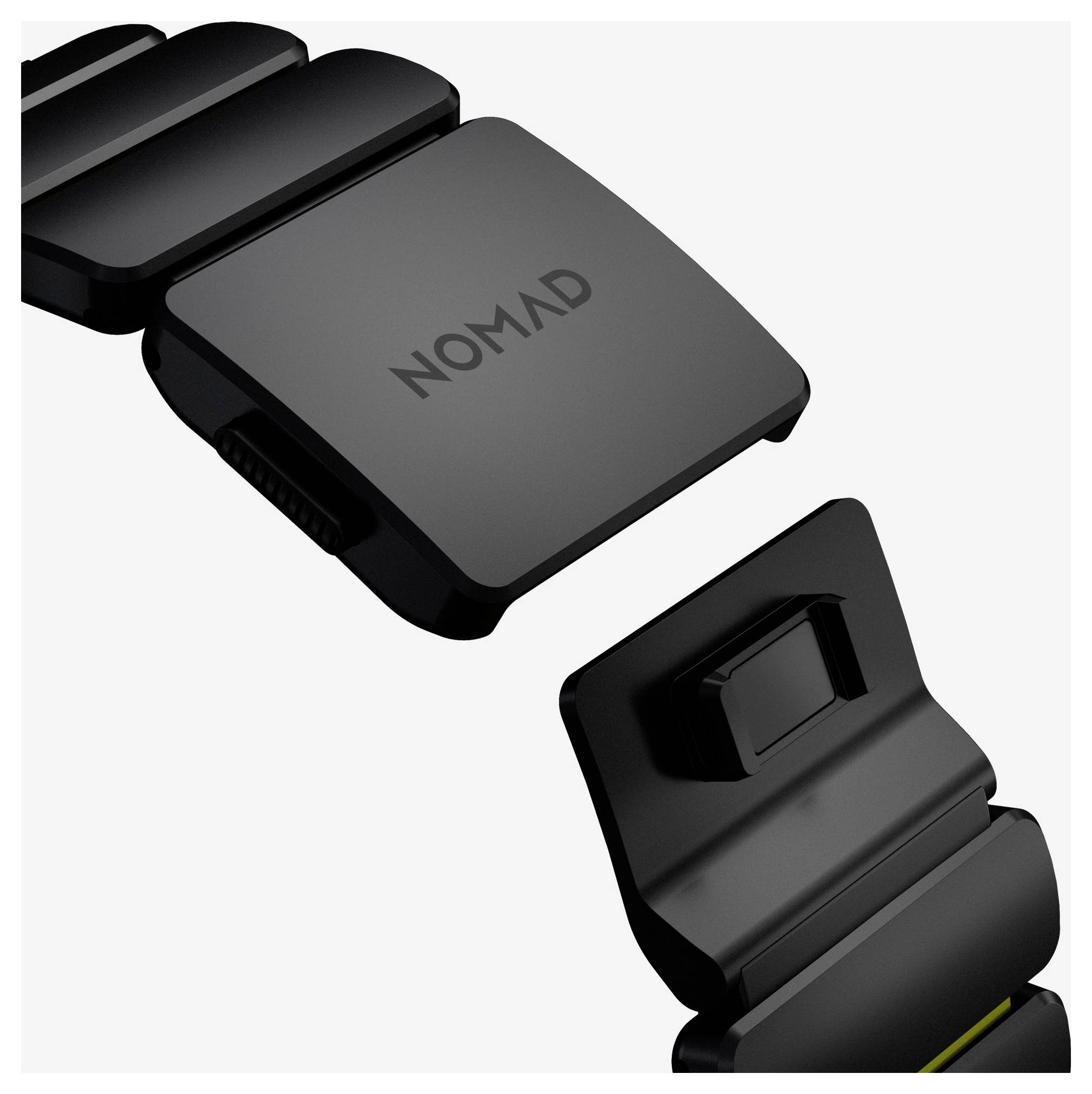 Accessoire de montre/bracelet modulaire de marque Black Nomad présenté en vue éclatée, avec deux composants noirs connectés séparés pour montrer le mécanisme de verrouillage.