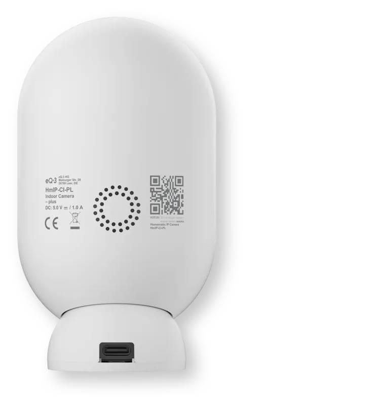 Caméra d'intérieur eufy blanche vue de l'arrière, avec étiquette produit, code QR, grille du haut-parleur et port USB-C sur la base.