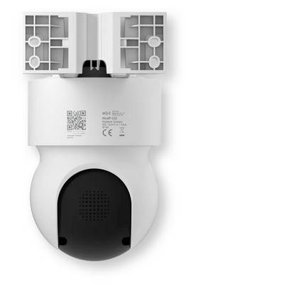 Vue de face d'un appareil électronique blanc monté en muraire avec deux panneaux supérieurs ouverts ressemblant à des grilles de ventilation, une étiquette code QR et un panneau inférieur noir sur un fond neutre.