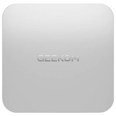 Appareil GEEKOM carré en argent aux coins arrondis et logo en relief centré sur un fond neutre.