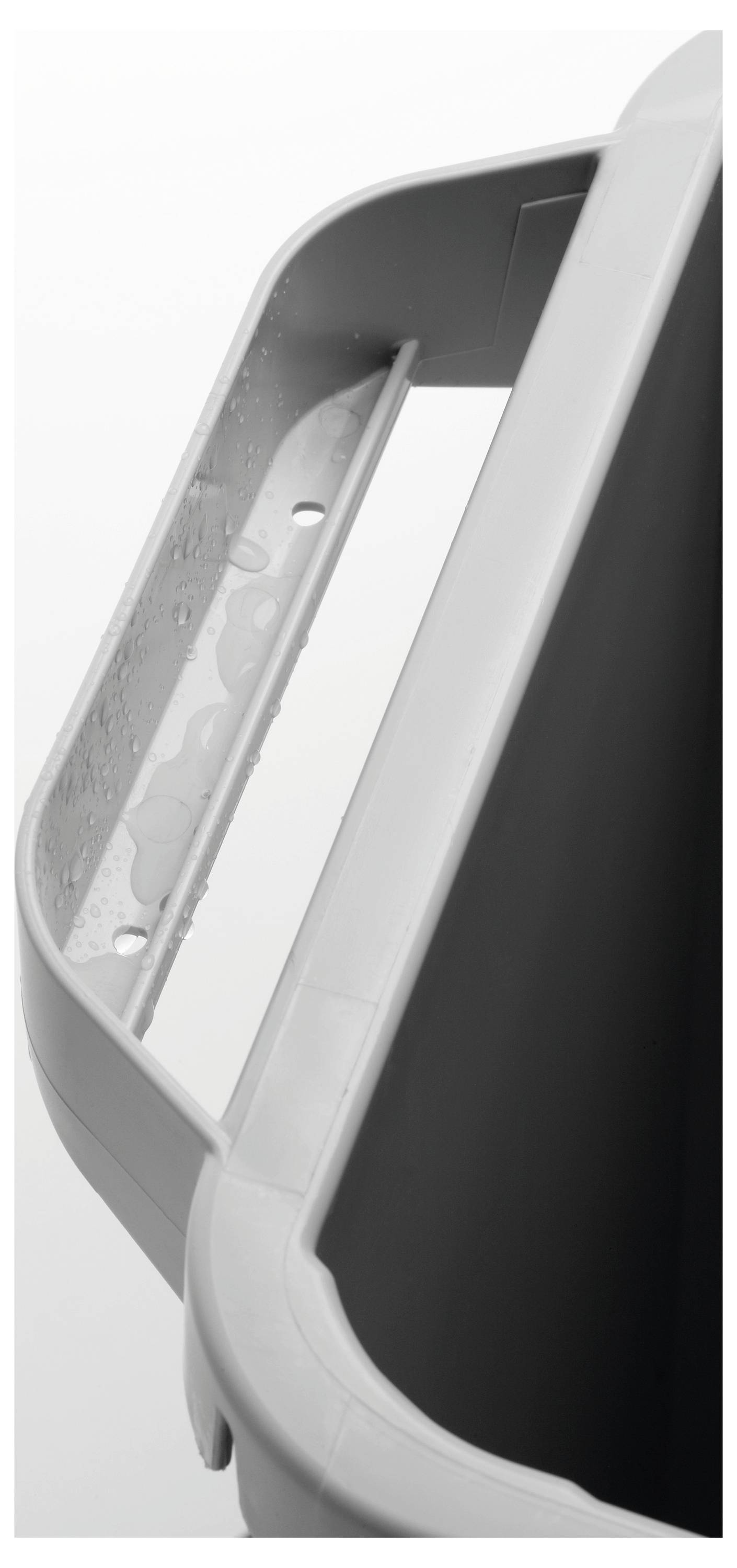 Conteneur à déchets gris rectangulaire avec poignées encastrées, présenté avec le label Ange Bleu et le badge du site Web indiquant un produit certifié sur le plan environnemental.