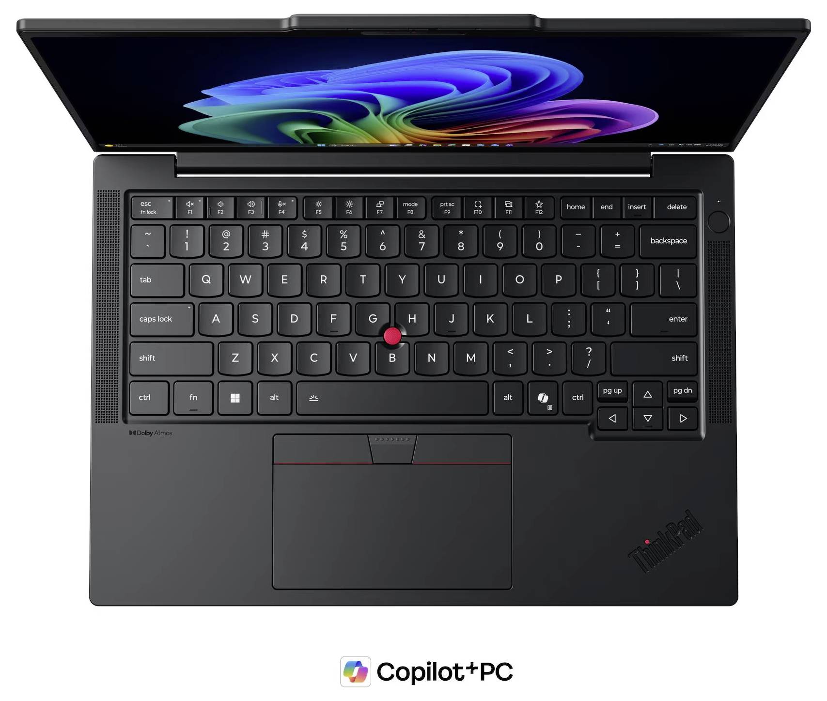 Vue de dessus d'un ordinateur portable Copilot+ PC noir avec un écran coloré, un clavier, un pavé tactile et un petit joystick TrackPoint rouge.