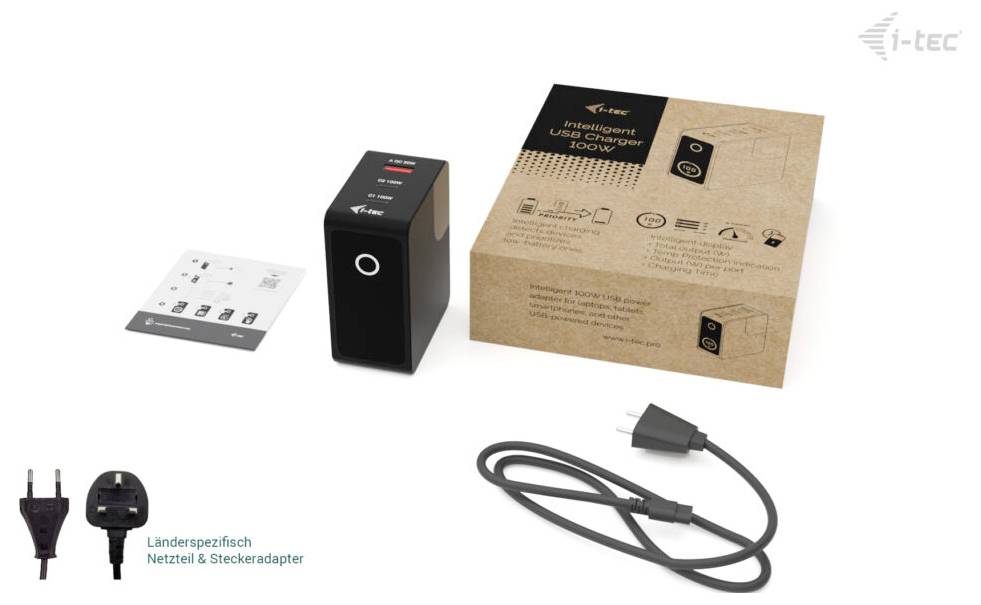 Contenu du coffret de rallonge i-tec : unité d'alimentation noire, feuille d'instructions, câble d'alimentation et adaptateur de prise spécifique au pays, présenté avec la boîte de vente au détail.