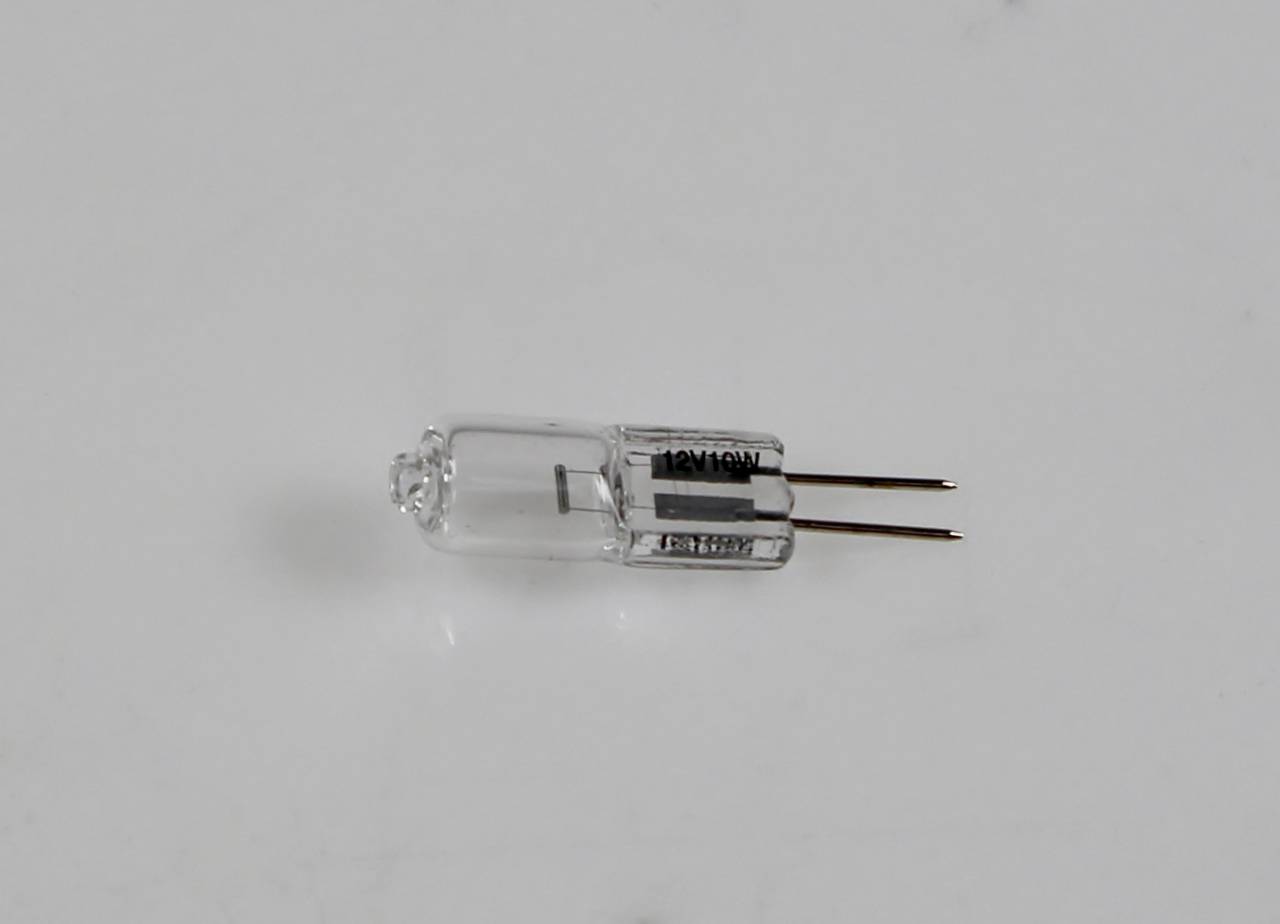 Petite ampoule halogène transparente en capsule avec deux broches métalliques, étiquetée « 12V 10W », sur un fond blanc uni
