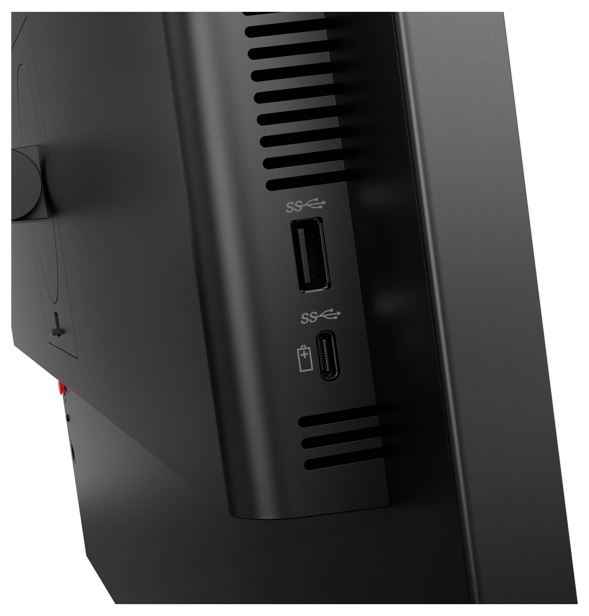 Gros plan du panneau avant du boîtier informatique noir avec ports USB-A et USB-C et fentes de ventilation.