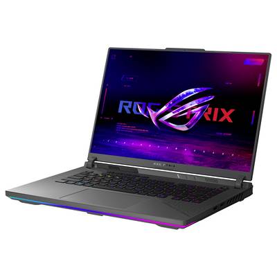 Ordinateur portable de jeu ouvert affichant le logo ROG sur son écran, avec un clavier rétroéclairé RGB et un châssis gris.