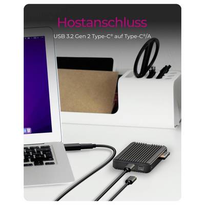 Ordinateur portable connecté à un petit concentrateur USB noir compact ; le texte indique « Hostanschluss » et « USB 3.2 Gen 2 Type-C® vers Type-C®/A ».