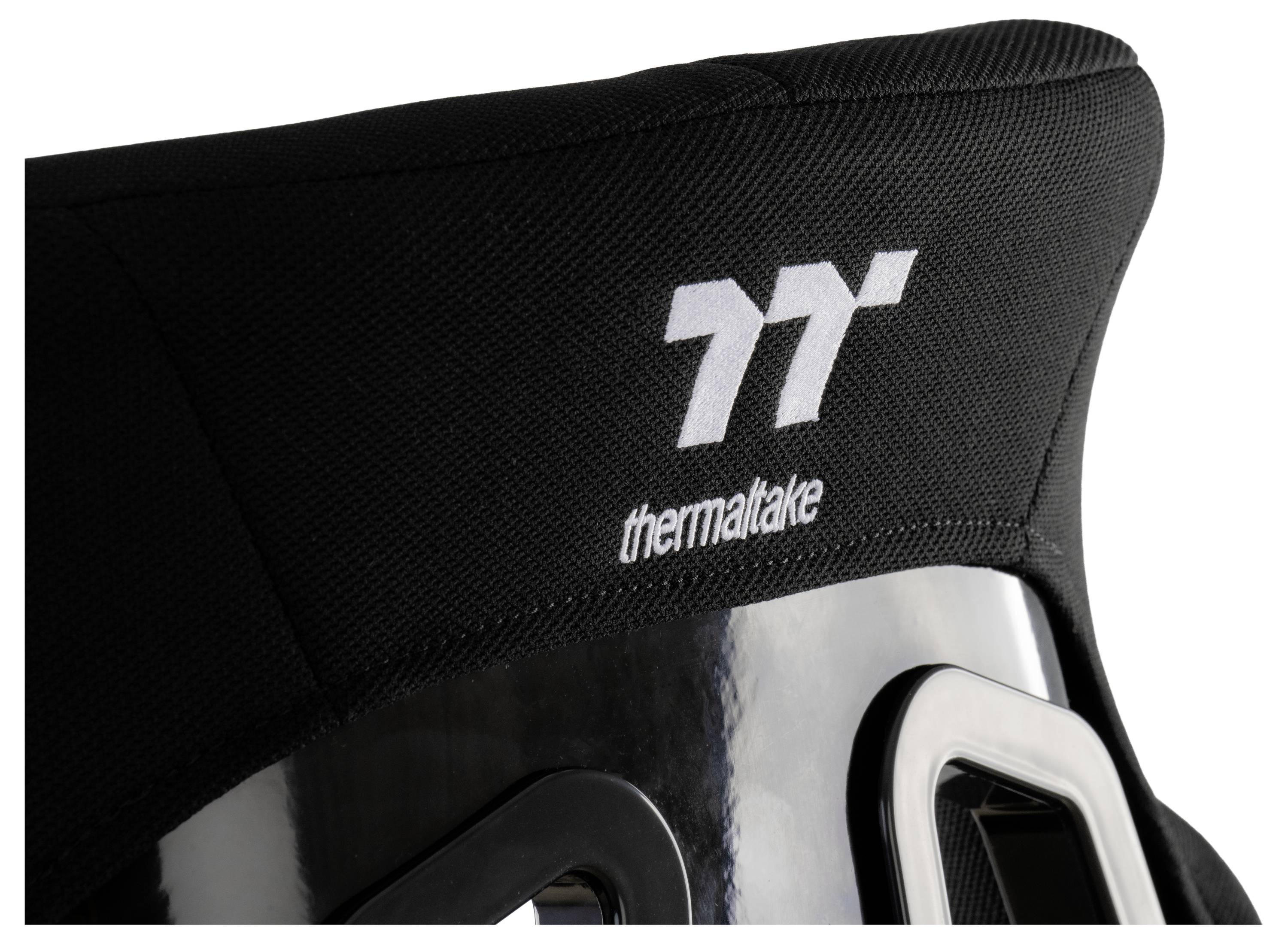 Gros plan d'un appuie-tête de chaise de jeu Thermaltake noire avec le logo blanc brodé sur du tissu texturé.