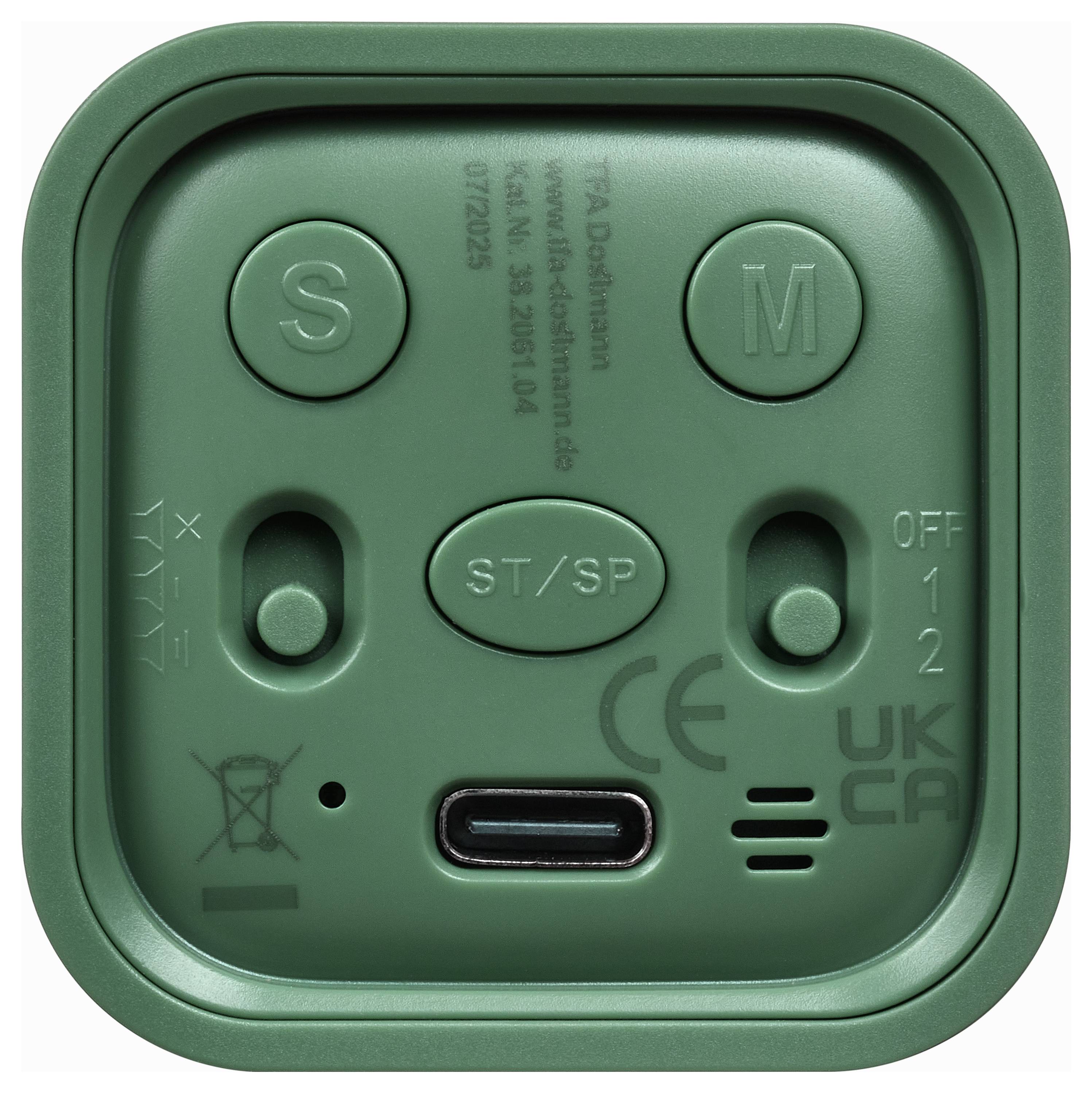 Appareil électronique de forme carrée verte vu de face avec des boutons étiquetés S, M et ST/SP, deux curseurs, un port USB-C et des marquages CE/UKCA.