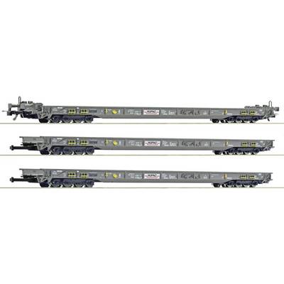 Trois images de vue latérale d'un long wagon de fret HUPAC gris, présentées dans différentes configurations sur un fond blanc.