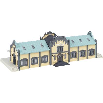 Modèle 3D d'un bâtiment de gare historique avec un toit bleu canard, une entrée centrale et des marches, présenté isolé sur un fond blanc.