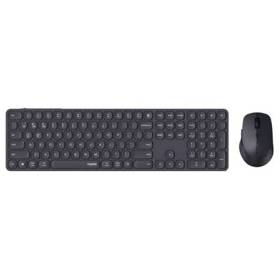 Clavier noir sans fil de taille réelle avec pavé numérique et souris assortie présentés côte à côte sur un fond blanc.