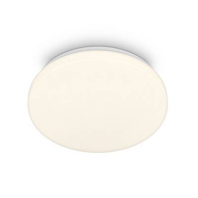 Appareil d'éclairage de plafond blanc et rond sur un fond blanc uni.