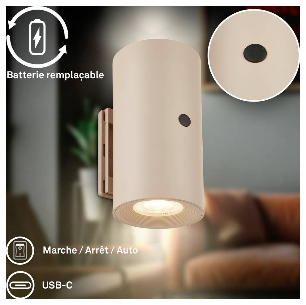 Applique murale cylindrique beige avec capteur visible, étiquetée « Batterie remplaçable », « Marche / Arrêt / Auto » et « USB-C ».