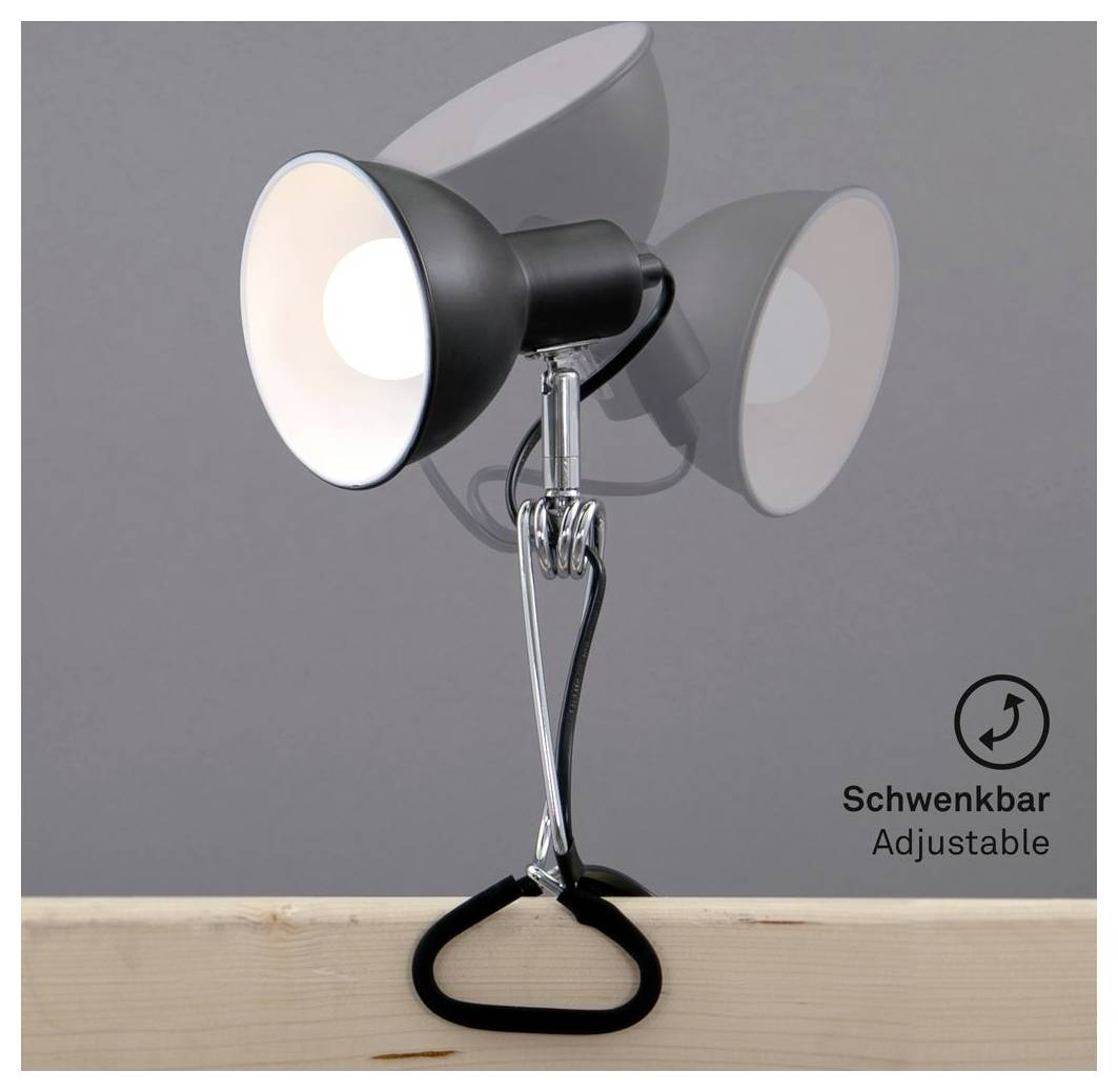 Lampe de projecteur orientable avec pince noire fixée à une corniche en bois, montrant un mouvement pivotant de côté ; le texte indique « Schwenkbar Adjustable ».