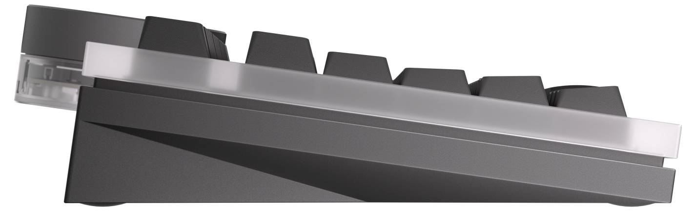 Vue de côté d'un clavier noir et argenté ou d'un commutateur de touche, présenté en angle sur un fond blanc.